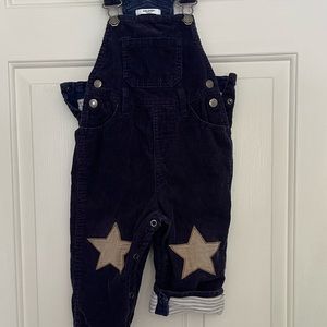 Baby Boden navy corduroy overalls with grey star patch